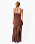 model wearing a brown dress on a white background, back 
