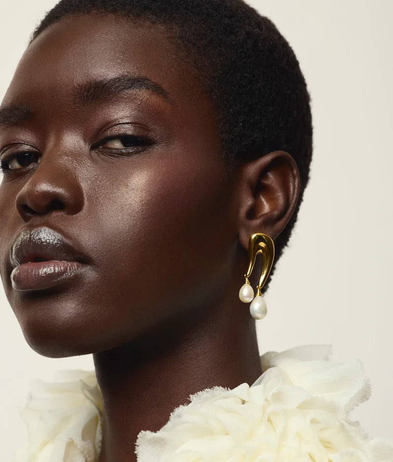 Sculptra Earrings on model