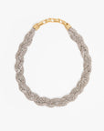 Silver beaded necklace with a gold clasp on a white background