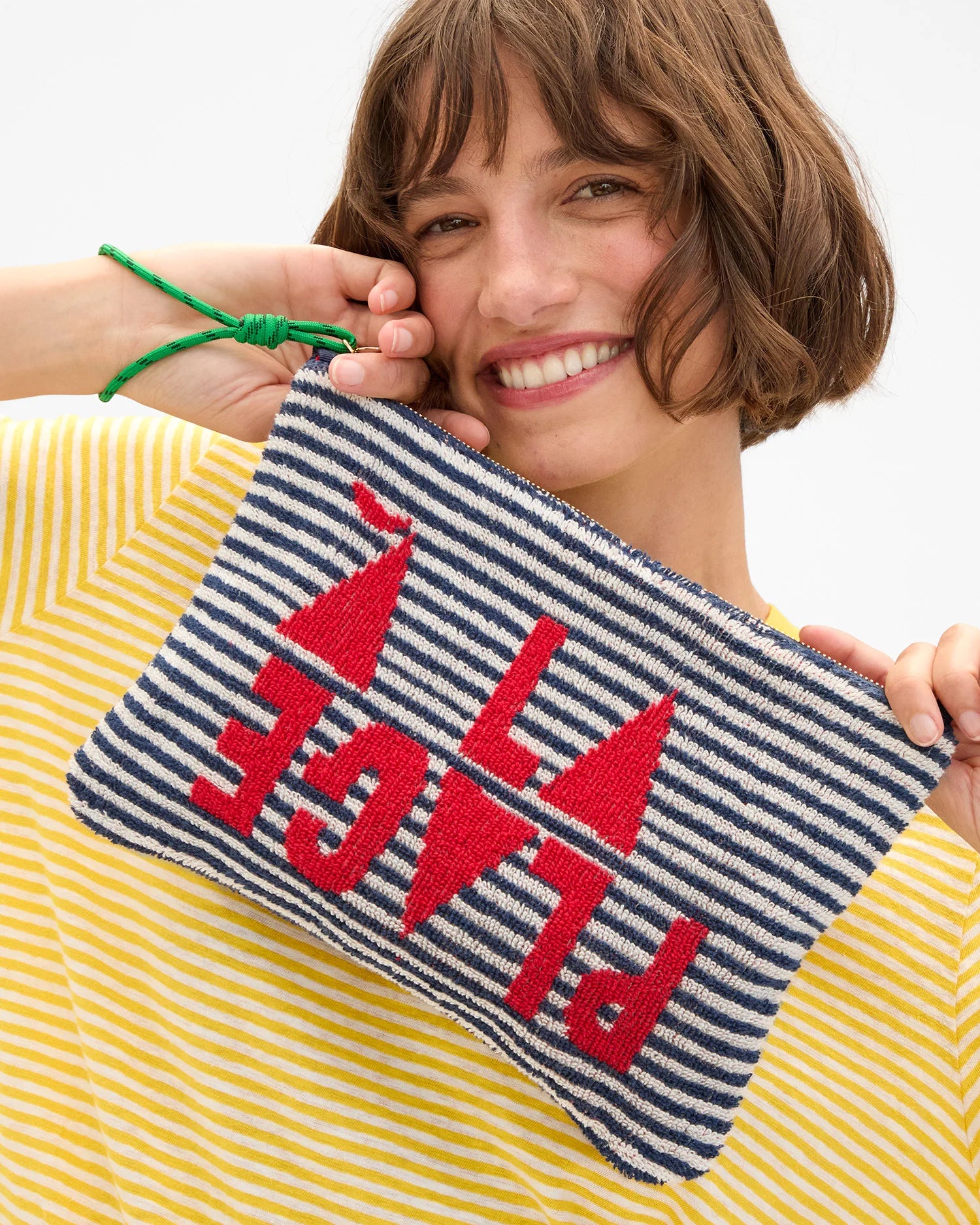 Flat Clutch w/ Tabs Deep Dive/Cream Stripe held up by model