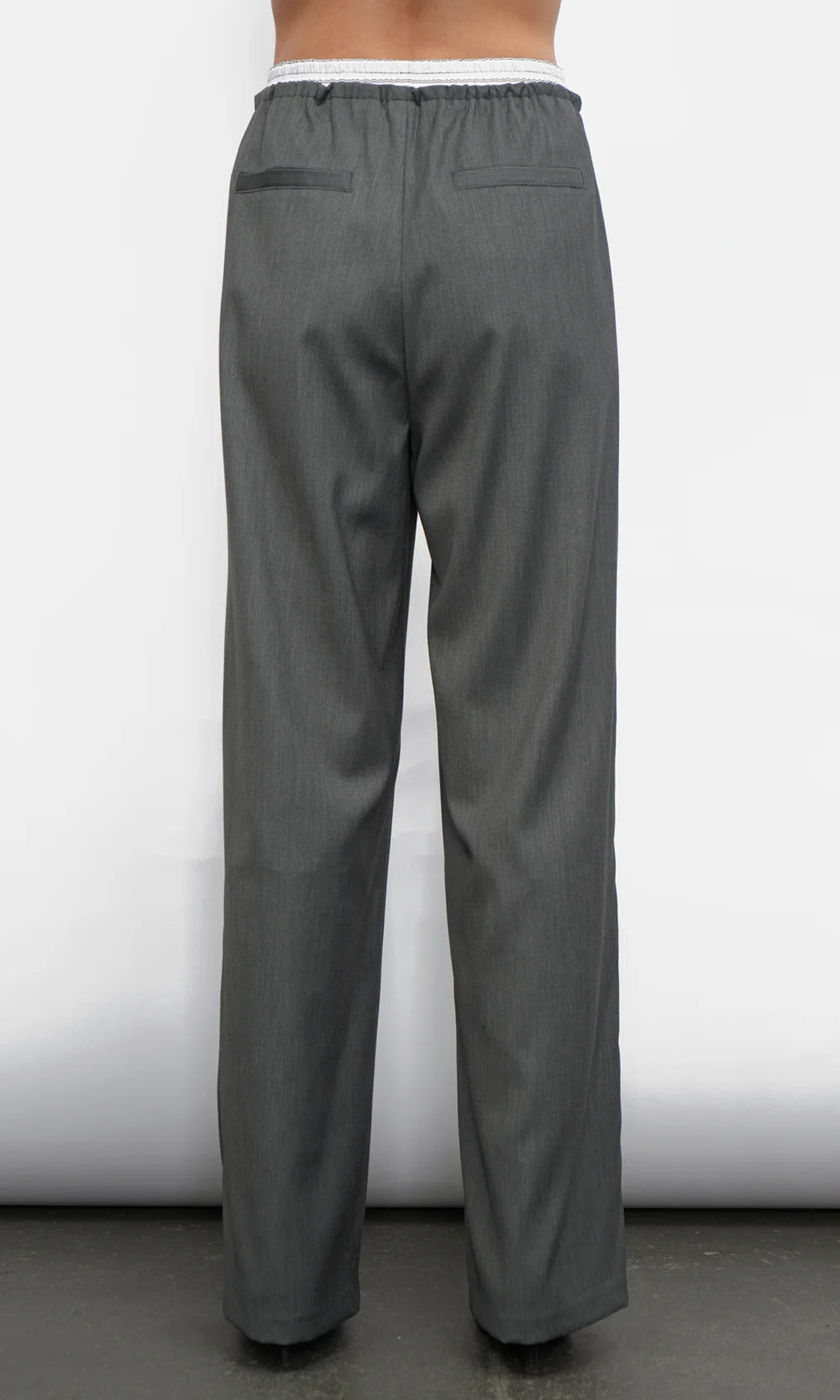 Gray pants on a white background, back