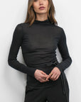 Astra High Neck Long Sleeve Sheer Knit Top front view with belt