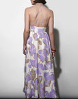 Woman wearing a floral dress with a white background