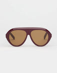 garnet oversized sunglasses with amber lenses on a white background 