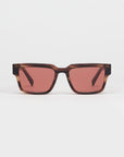 Square sunglasses with a translucent redish brown tortoiseshell frame and light red lenses, shown against a plain light gray background.