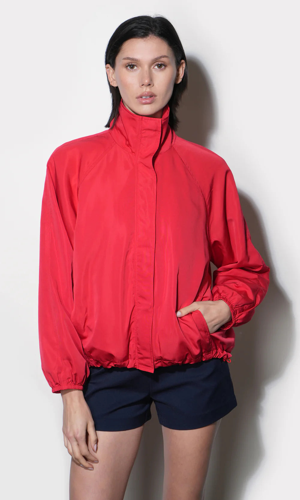 Gabrielle Lightweight Funnel Neck Jacket all the way zipped up