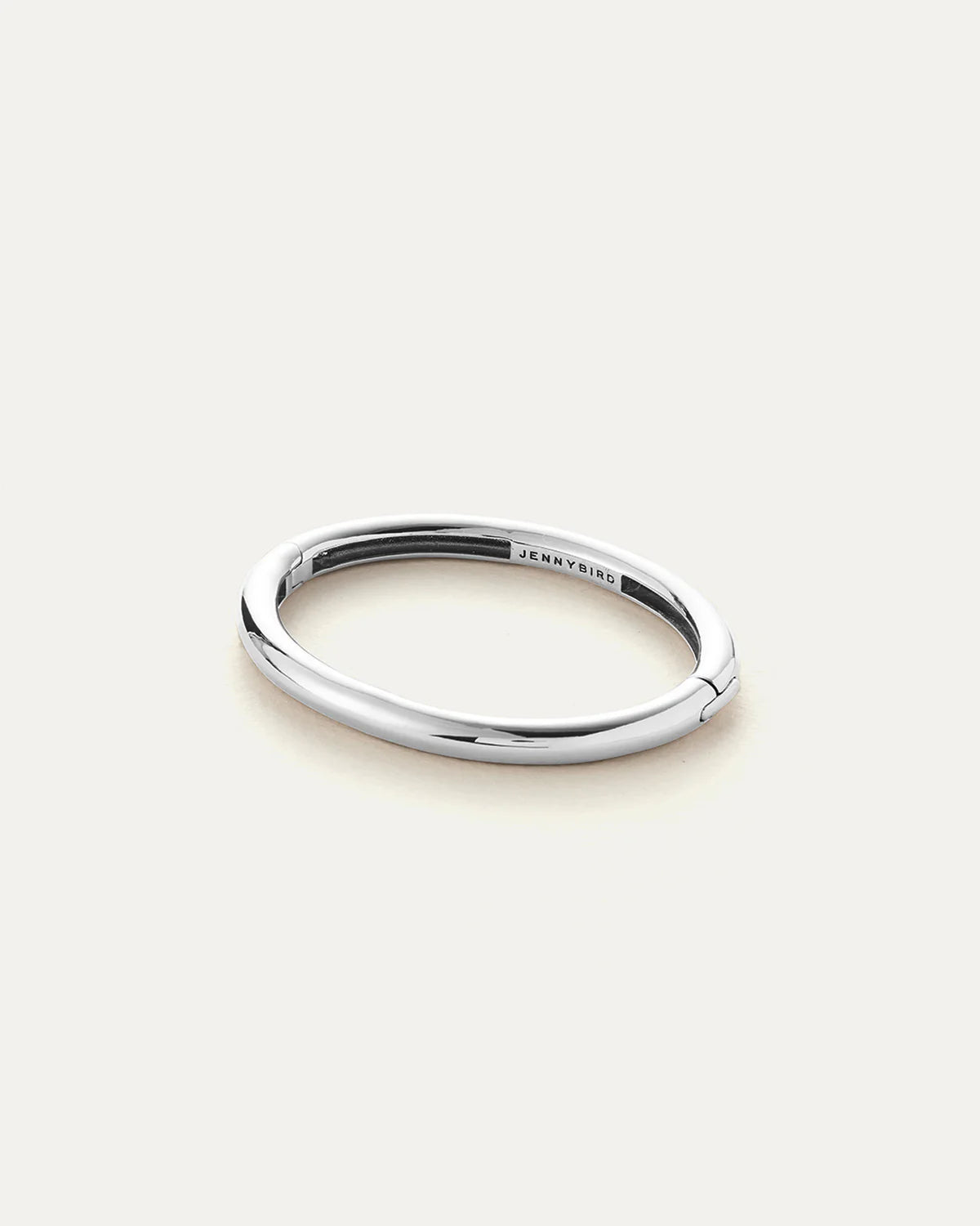 Silver ring with 'Jewelry' engraving on a white background