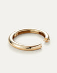 Gold ring with 'Jenny Bird' engraving on a white background