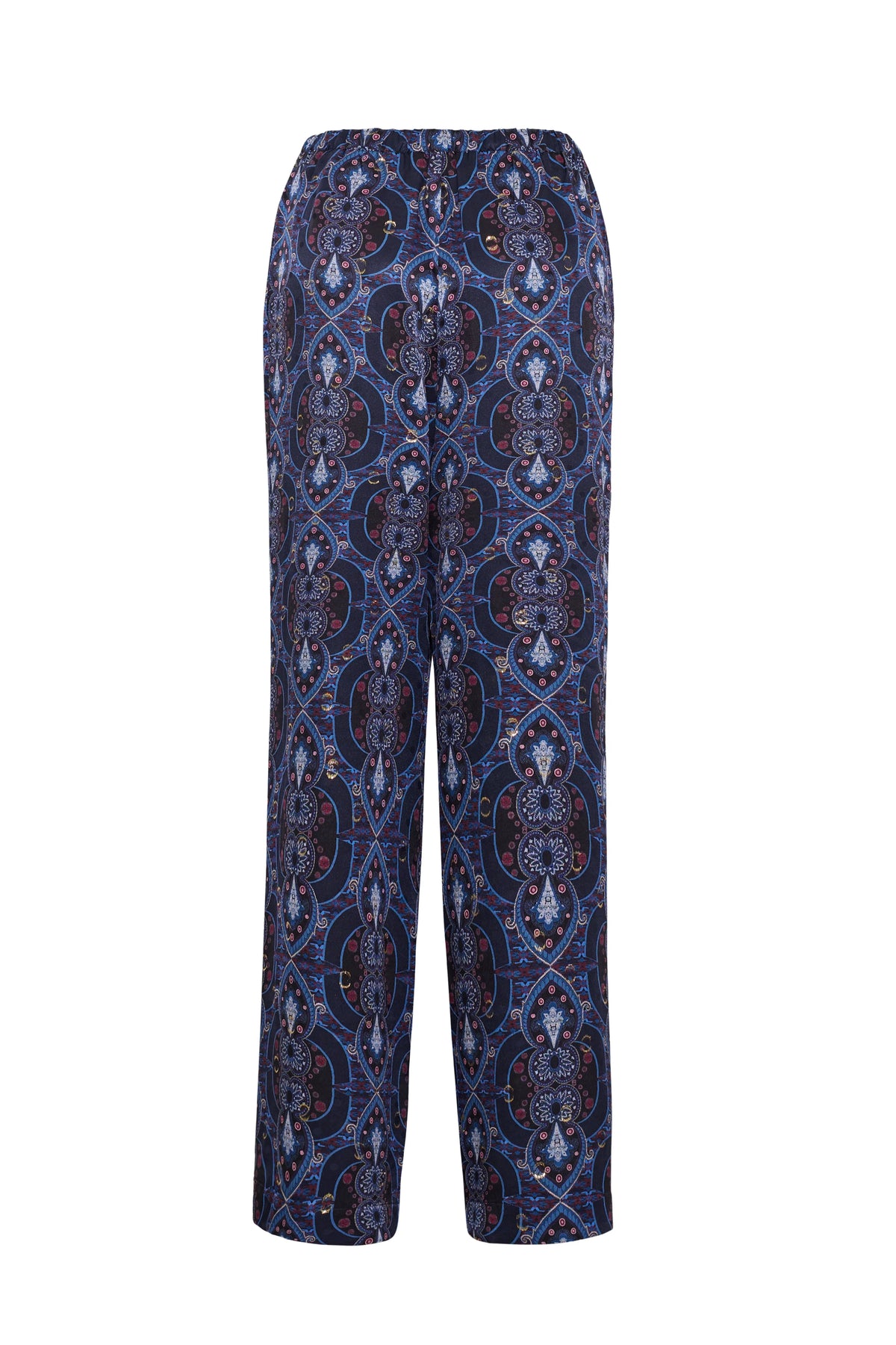 A pair of wide-leg trousers featuring an intricate geometric and floral pattern in navy blue, burgundy, and light blue, displayed against a solid white background.