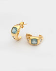 Giulia Hoop Earrings Aquamarine one earring laying down