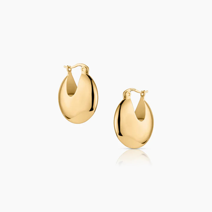 Gold hoop earrings on a white background