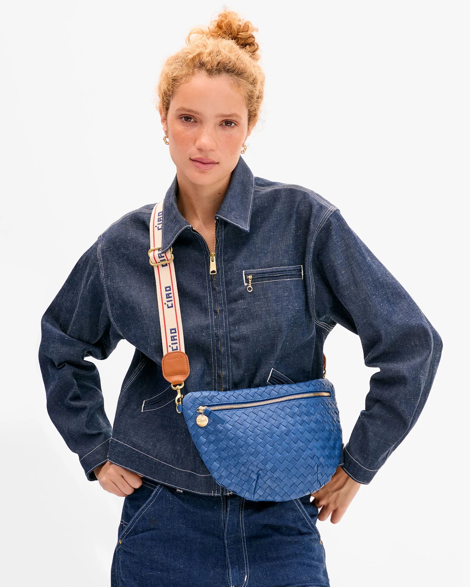 Adjustable Crossbody Strap attached to purse on model