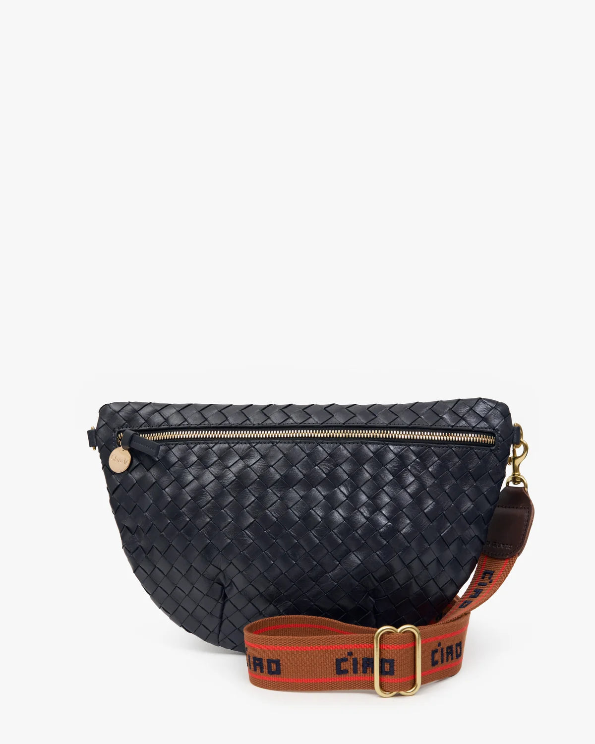 A woven leather half-moon fanny pack in navy blue with a brown webbed shoulder strap featuring the brand name 'CINO' in black, shown on a light gray background.