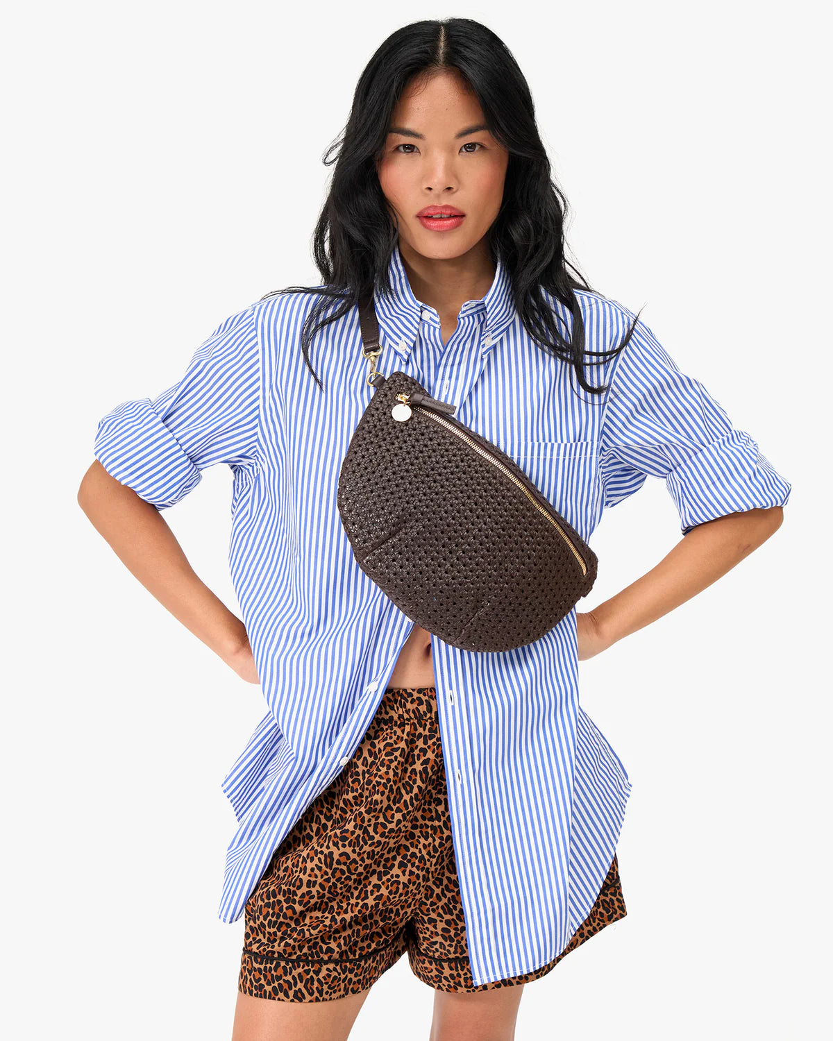 Grande Fanny in Chocolate Rattan front view on model worn as a crossbody