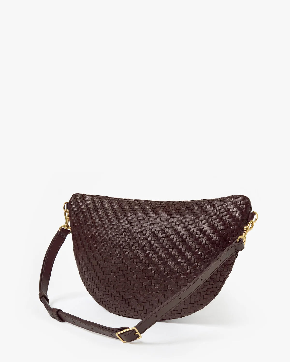 A dark brown woven leather crescent-shaped shoulder bag with a matching adjustable strap and gold-tone hardware, photographed on a clean white background.