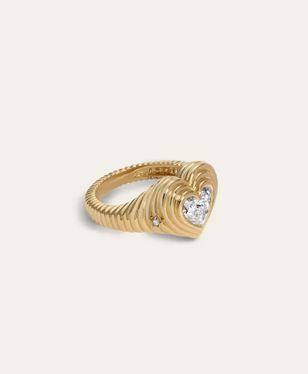  groovy diamond heart signet ring on white background, side