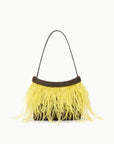 A small shoulder bag with a dark brown leather handle, a dark brown beaded top band, and bright yellow fringe hanging from the bottom, shown on a plain white background.