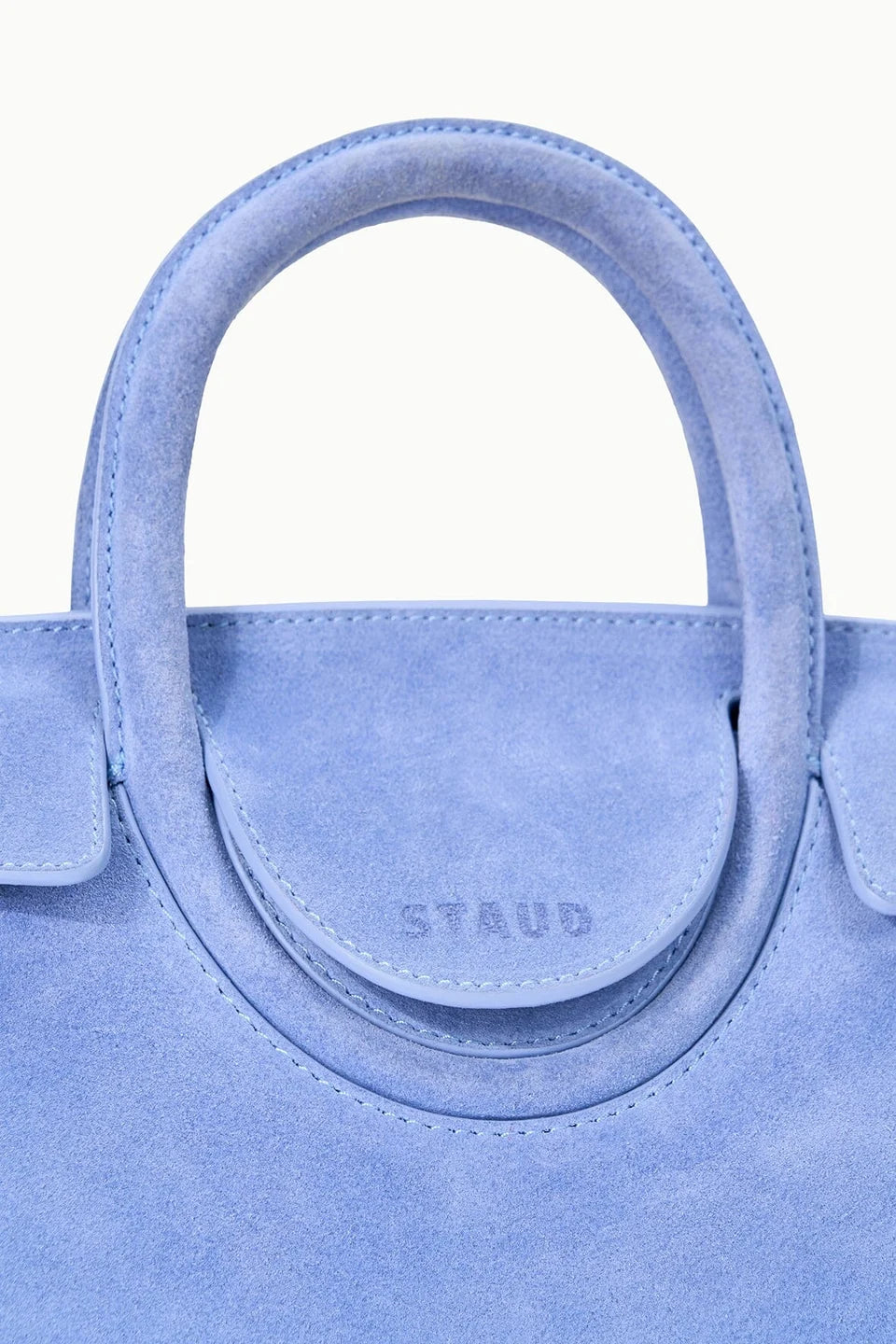 Maude Mini Carryall Cielo Suede close up Staud logo