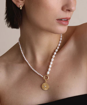 Half &amp; Half Pearl Necklace on model with charm attached 