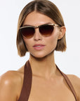 Heidi 12K Matte Black Fade Chroma + Blonde Venezia Sunglasses on model with average oval face shape