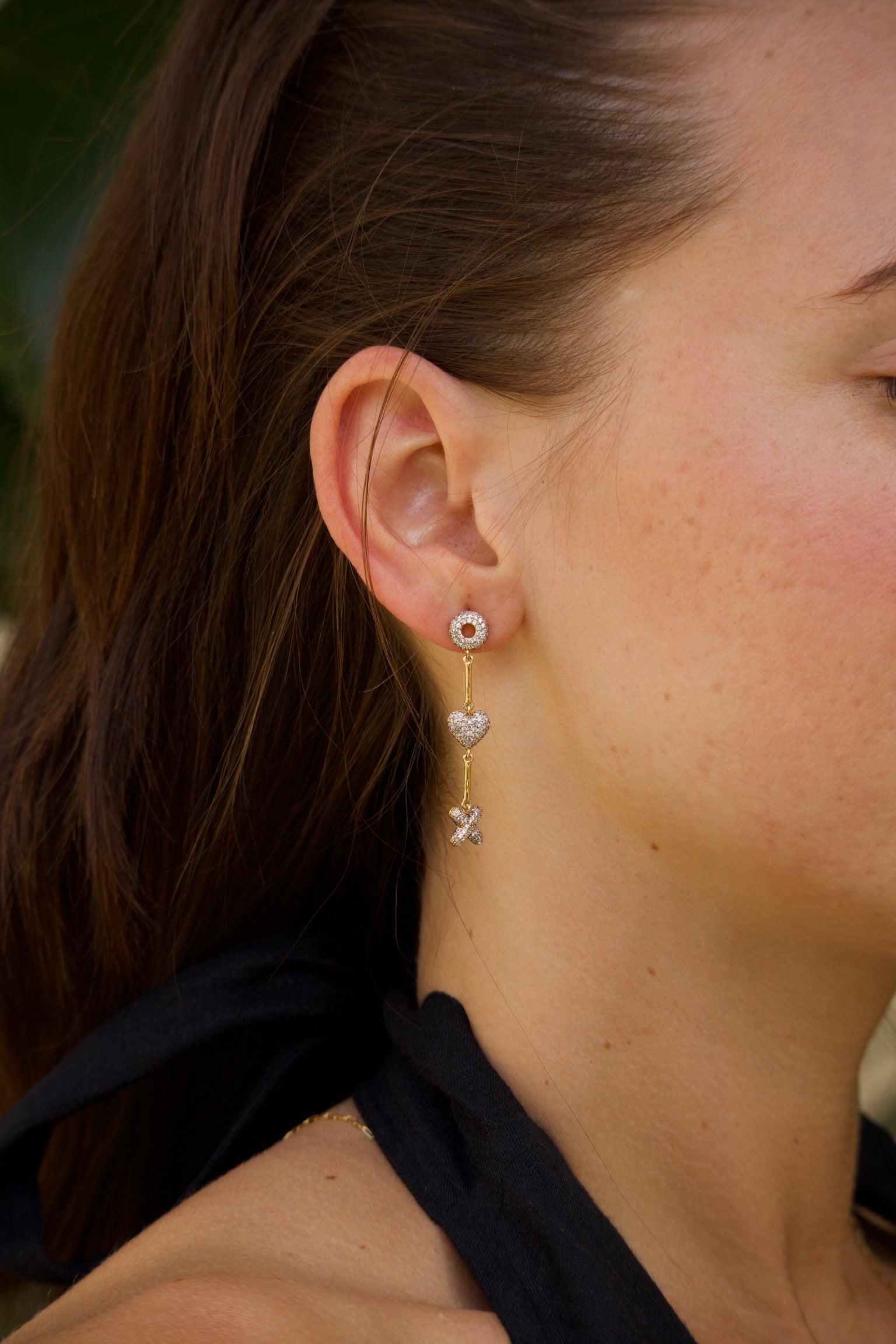 xoxo earrings close up