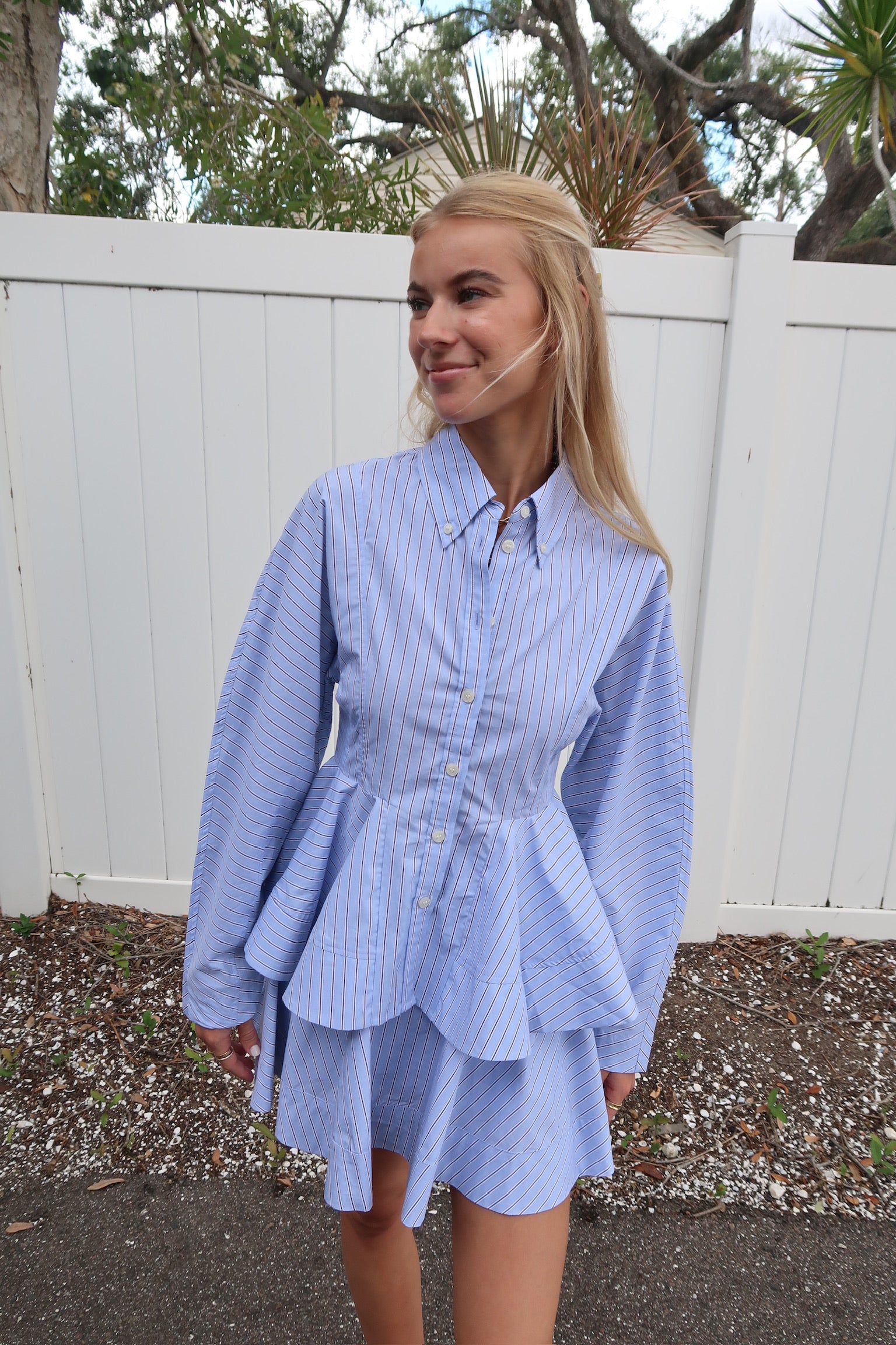 Light blue striped peplum shirt