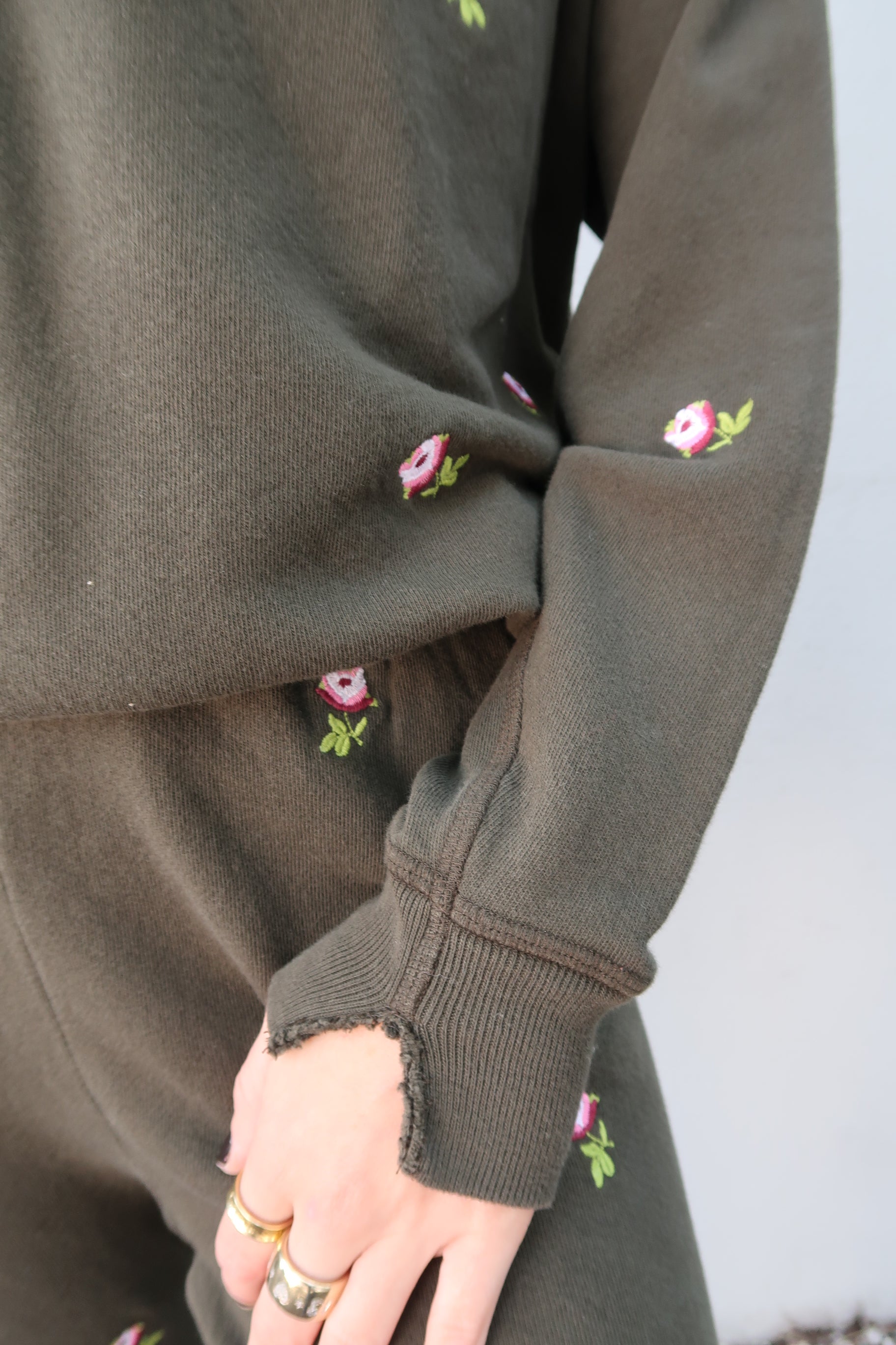 The College Sweatshirt Roses cuff detail
