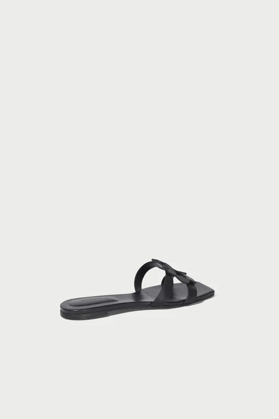 Black sandal on a light gray background, side/back 