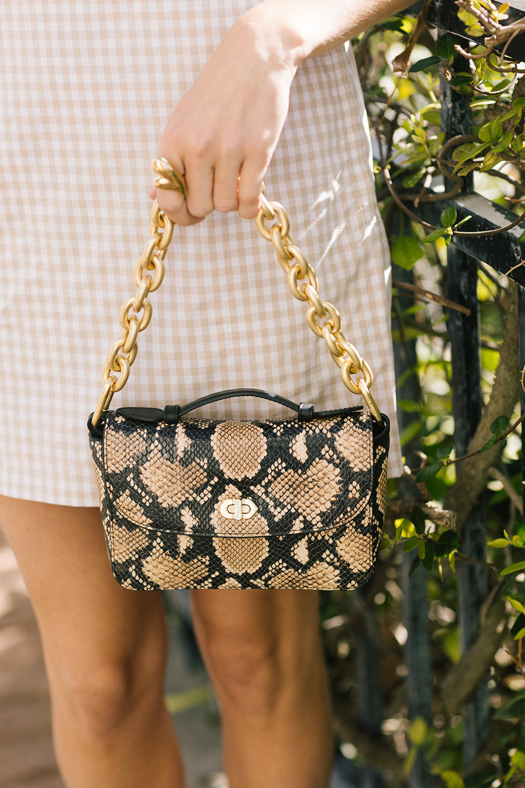 Shortie Strap Gold on snake print bag