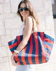 Beach Tote Canvas Stripe on model's shoulder with canvas shoulder straps