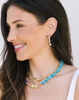 Triana Necklace and gold necklace on model