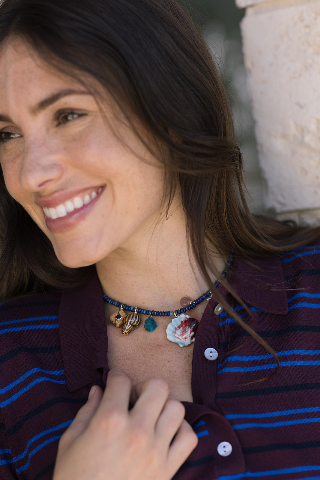 Woman wearing a striped shirt with Angora Necklace