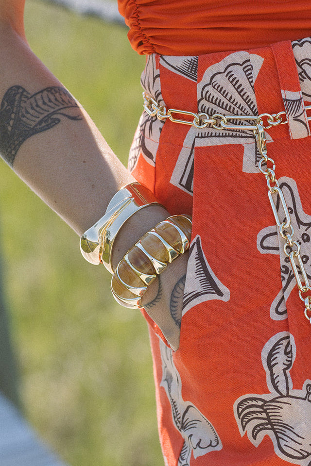 Stretch bracelet with gold bracelet