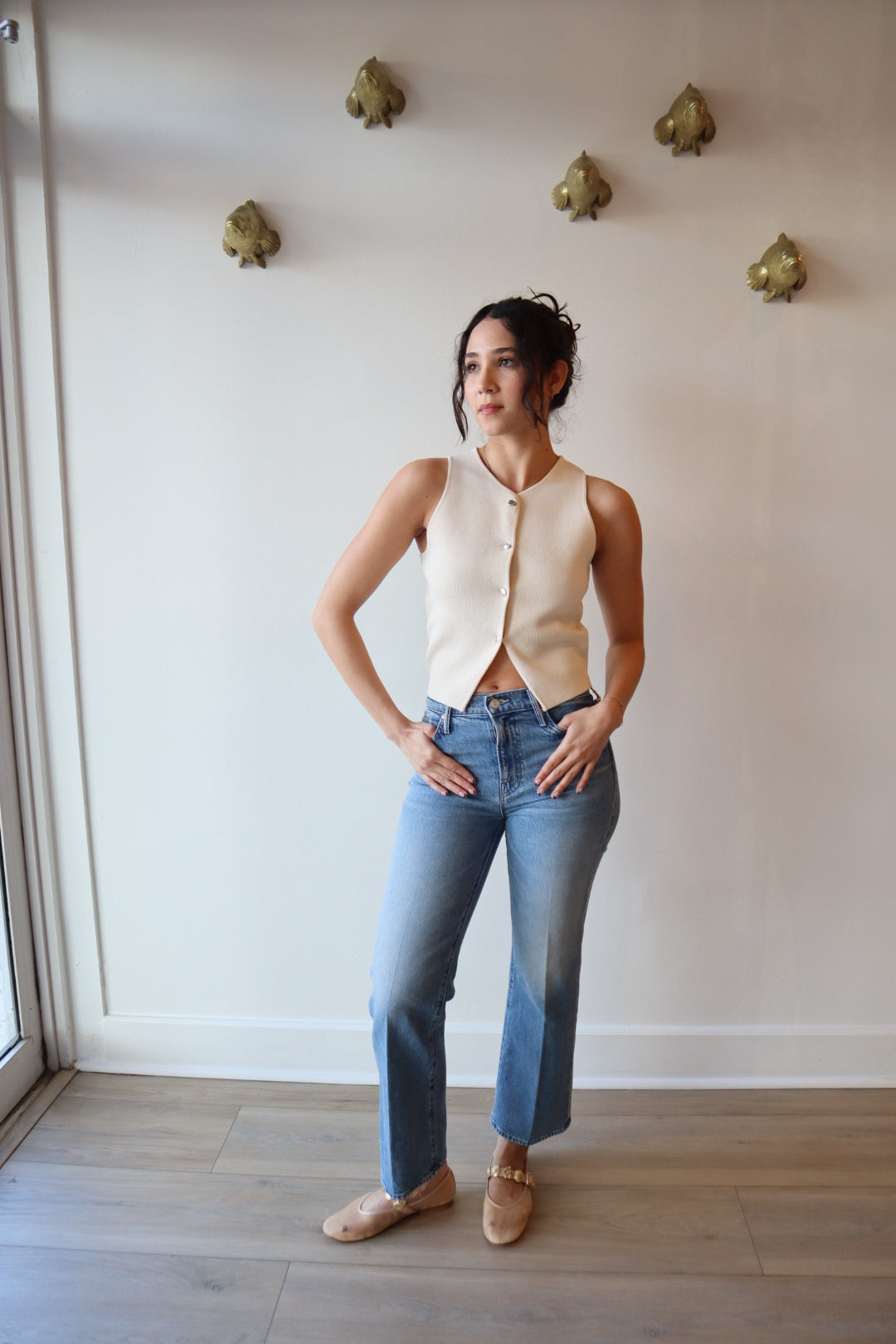 Model posing in the Ibiza Knit Vest Top