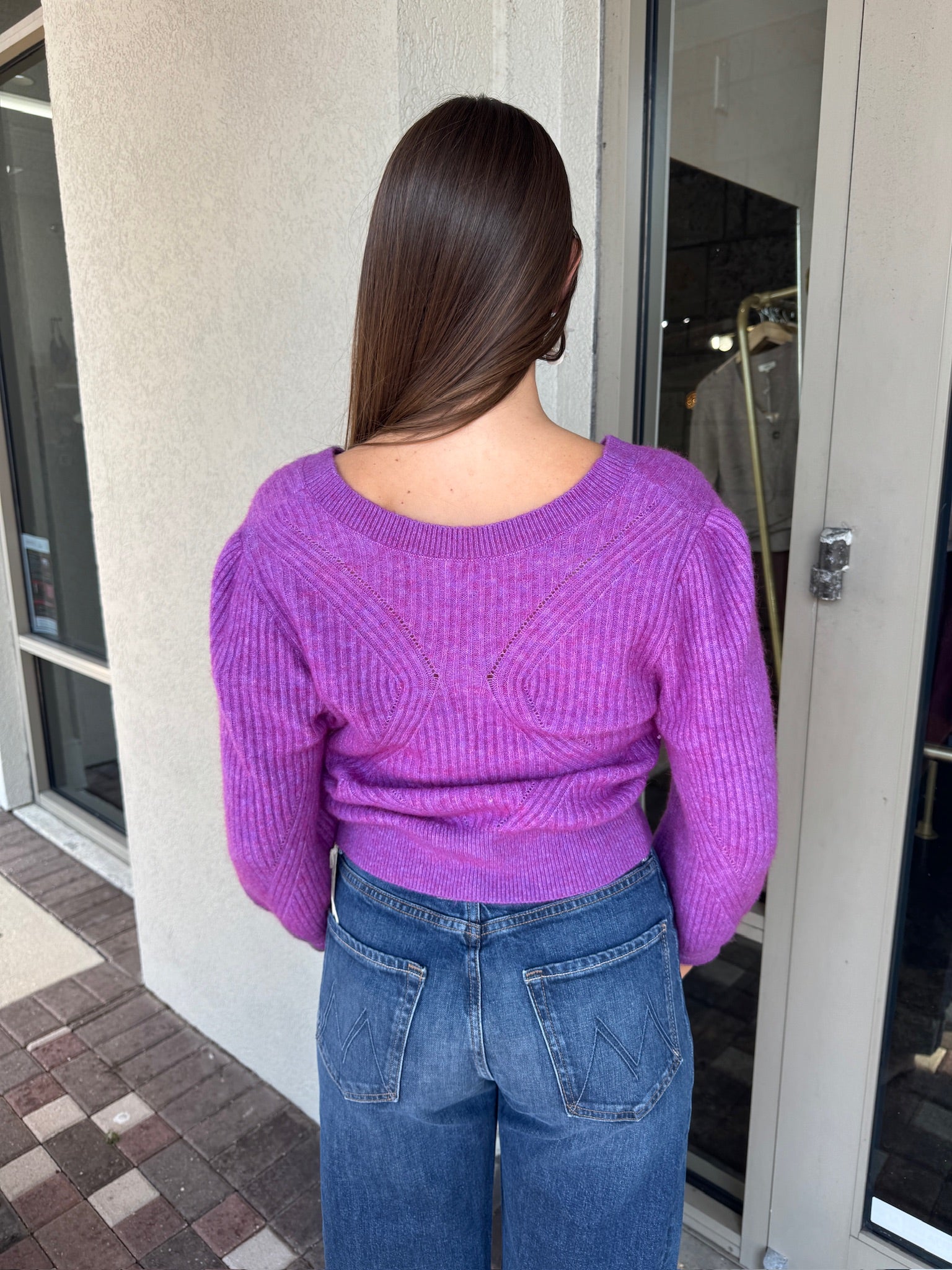 Pollen Reversible Sweater back view, buttons in front