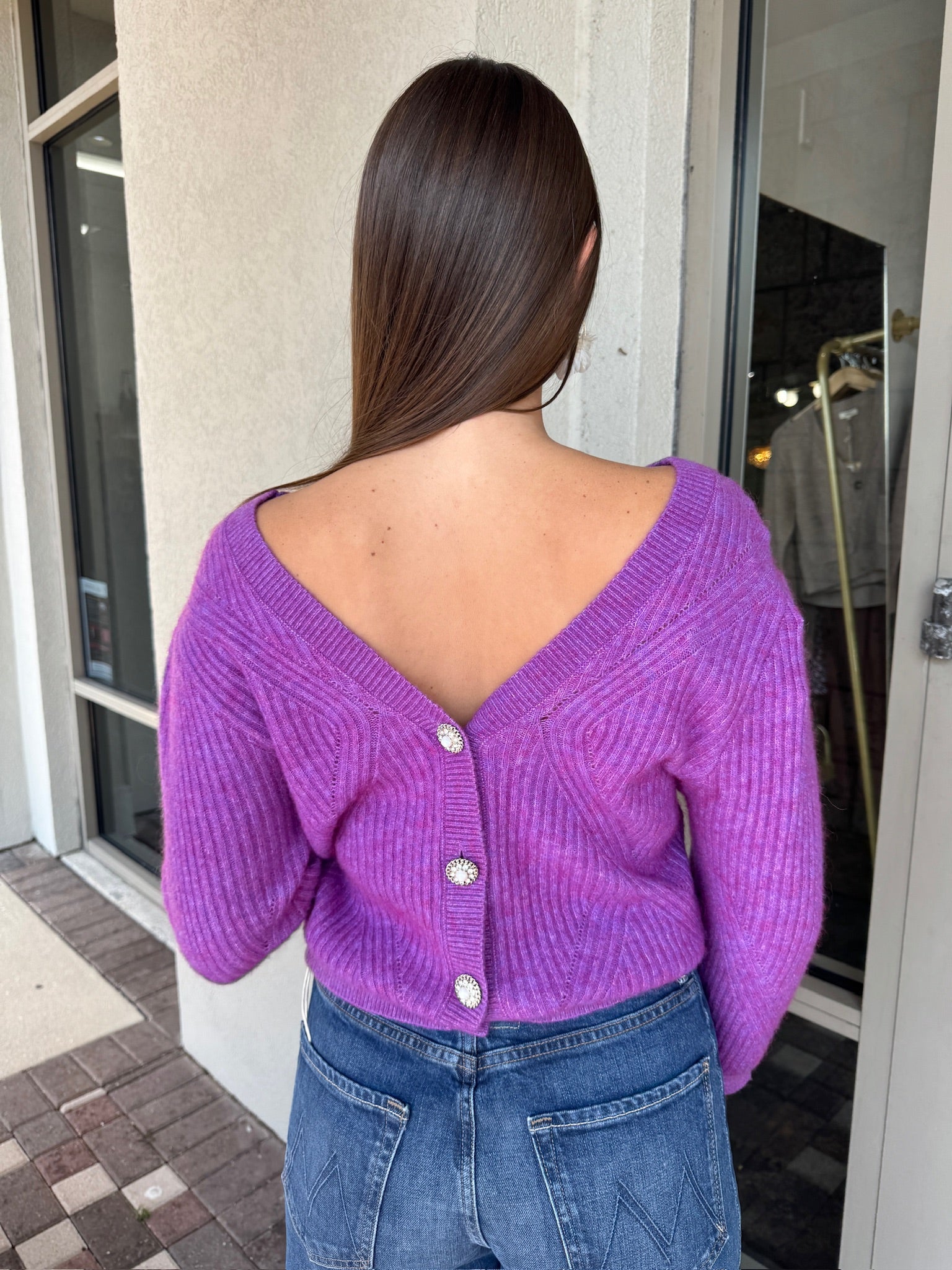 Pollen Reversible Sweater back view, button in back