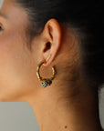 Tilly Earrings left side view on model