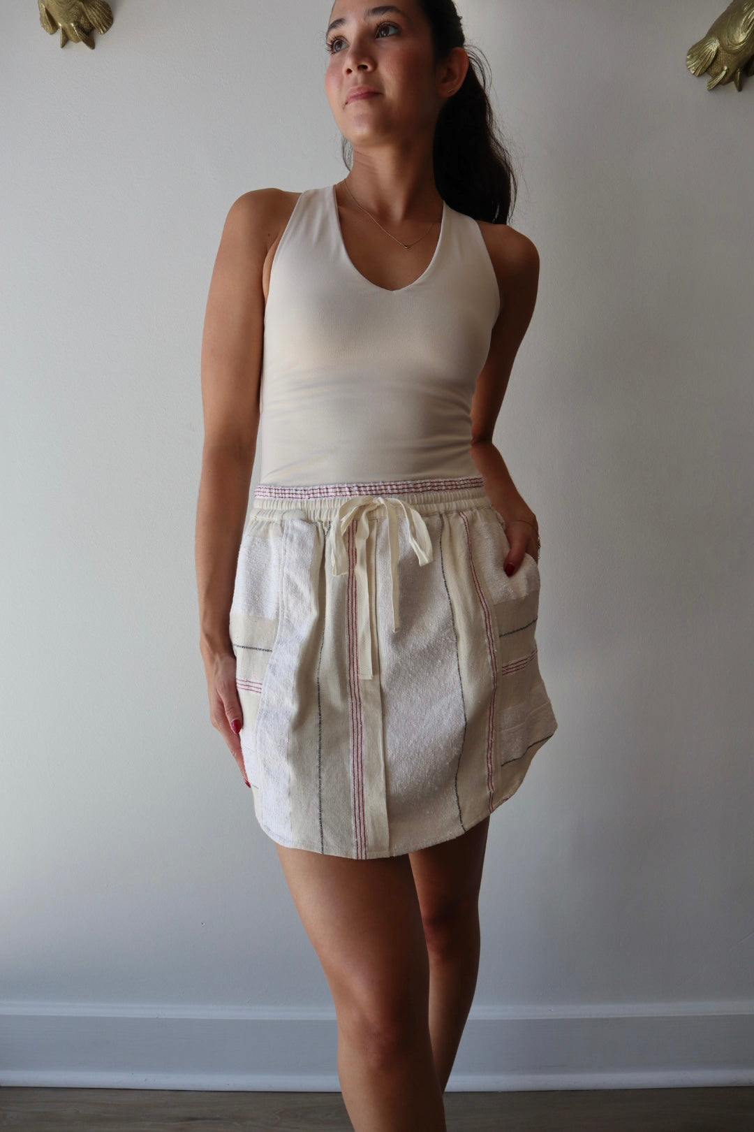 Abas Skirt closer up front view on model