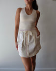 Abas Skirt closer up front view on model