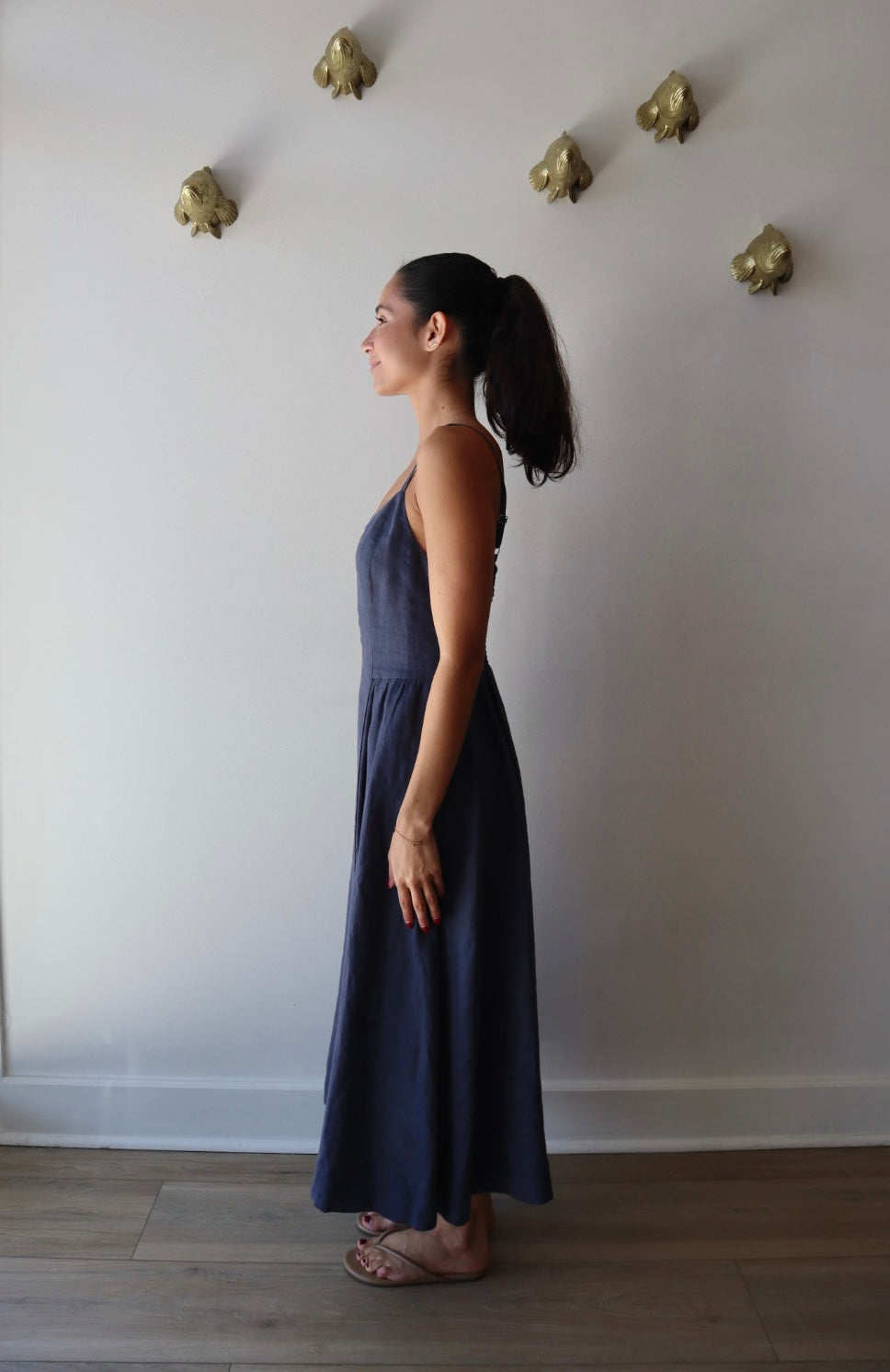 Bardot Dress in Navy full body side view on model