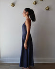 Bardot Dress in Navy full body side view on model