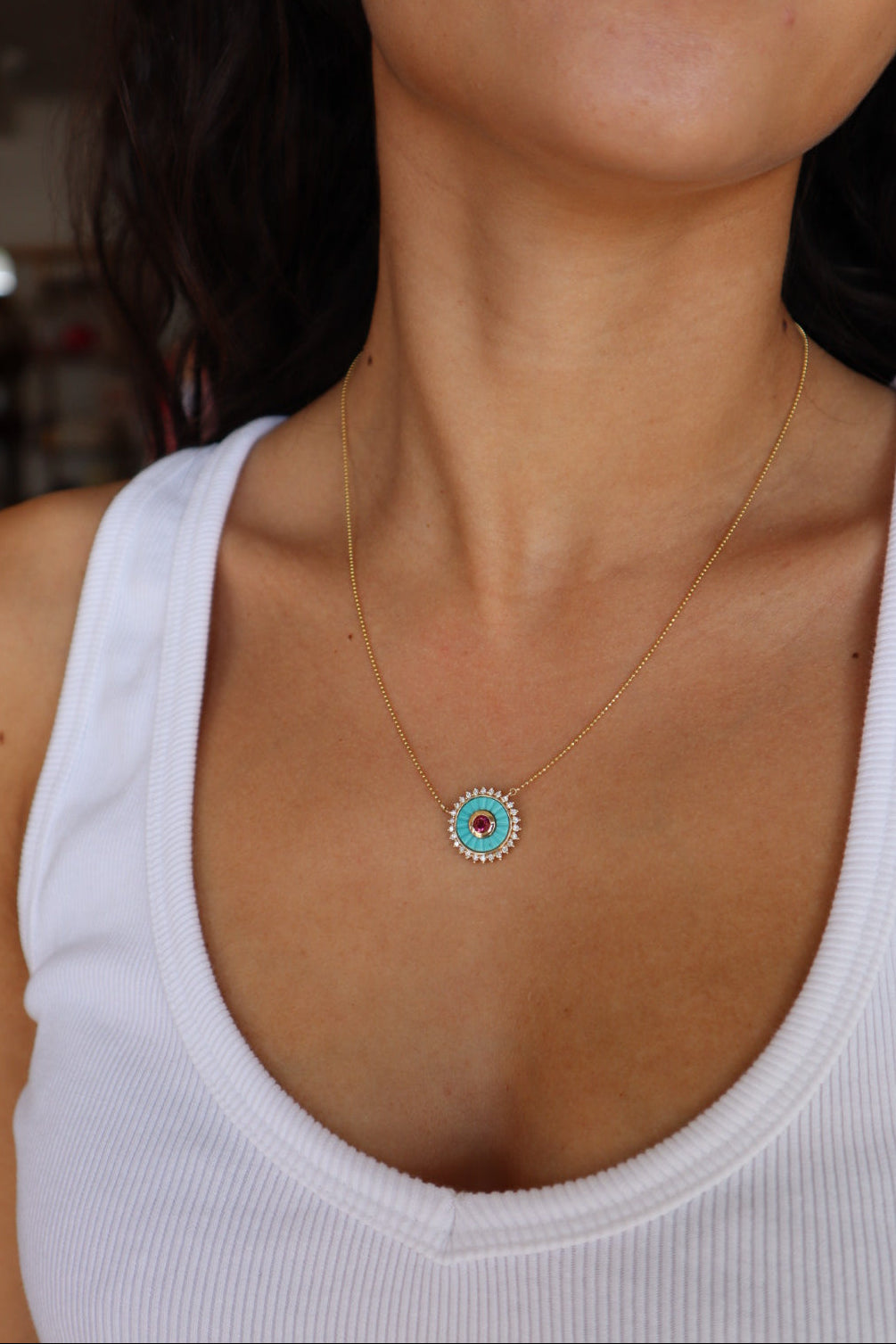 Mandala Medallion Necklace showing turquoise side on model's neck