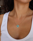 Mandala Medallion Necklace showing turquoise side on model's neck