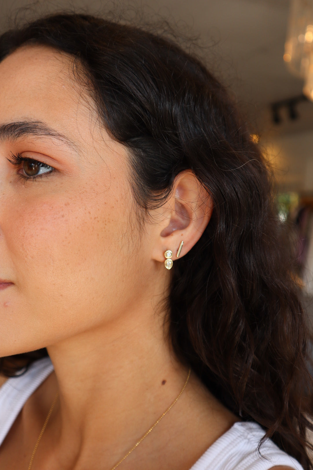Groovy Diamond Pear Drop Earrings side view on model