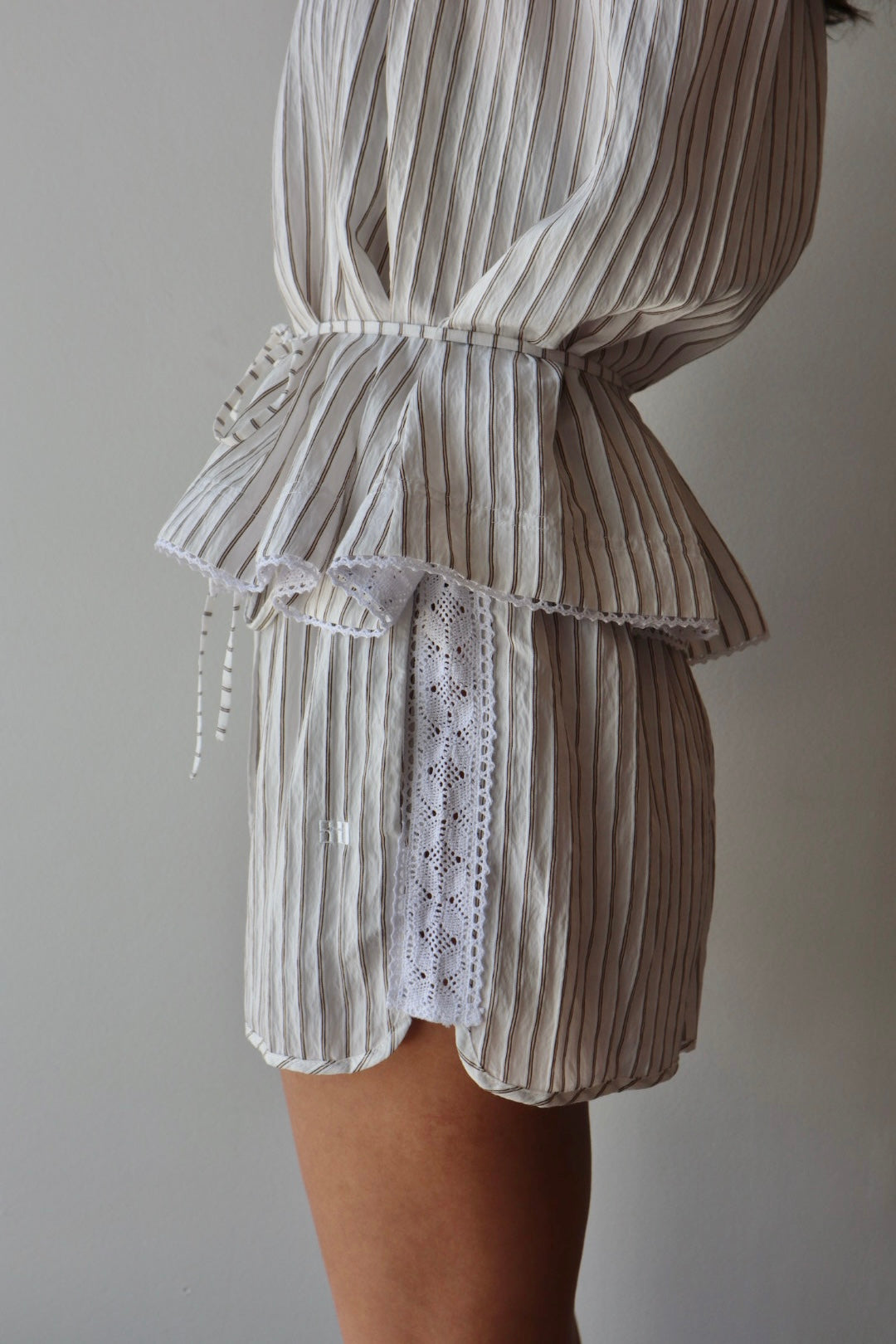 Brixen Stripe Short close up side view on model