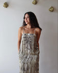 Khana Slip Dress closer up front view on model with hands in pockets