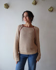 Avra Sweater front view on model with sleeves uncuffed