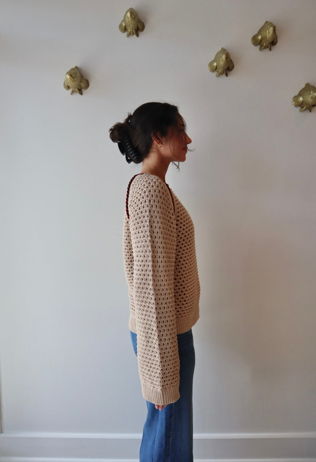 Avra Sweater side view on model with sleeves uncuffed