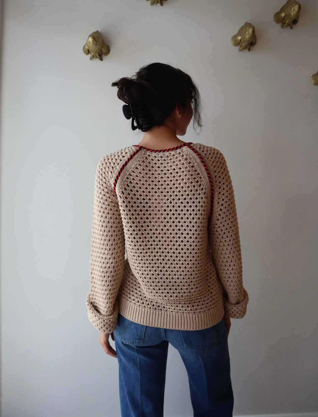 Avra Sweater back view on model with sleeves cuffed