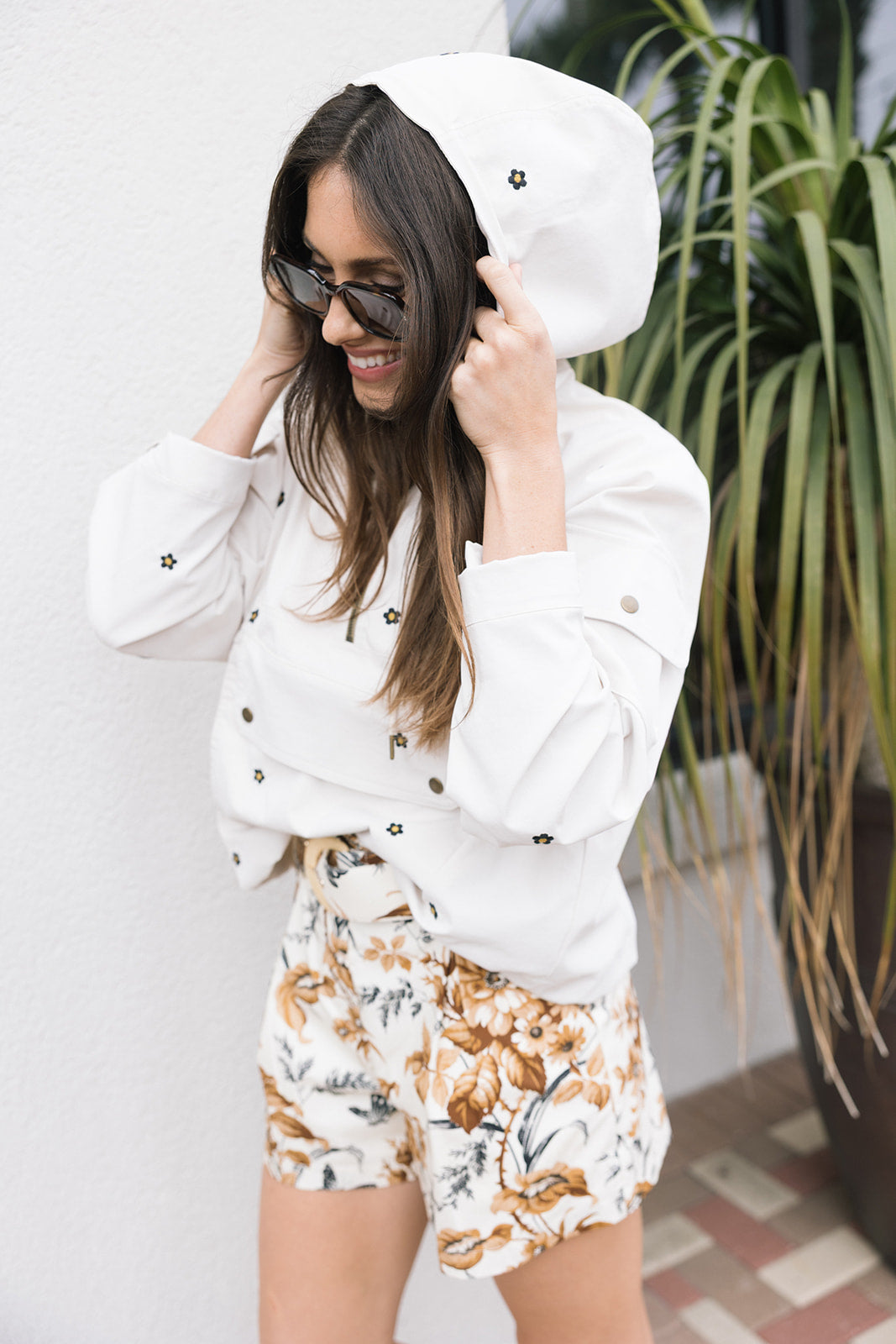 The Embroidered Crop Pullover Daisies with hood up and Palmer Short